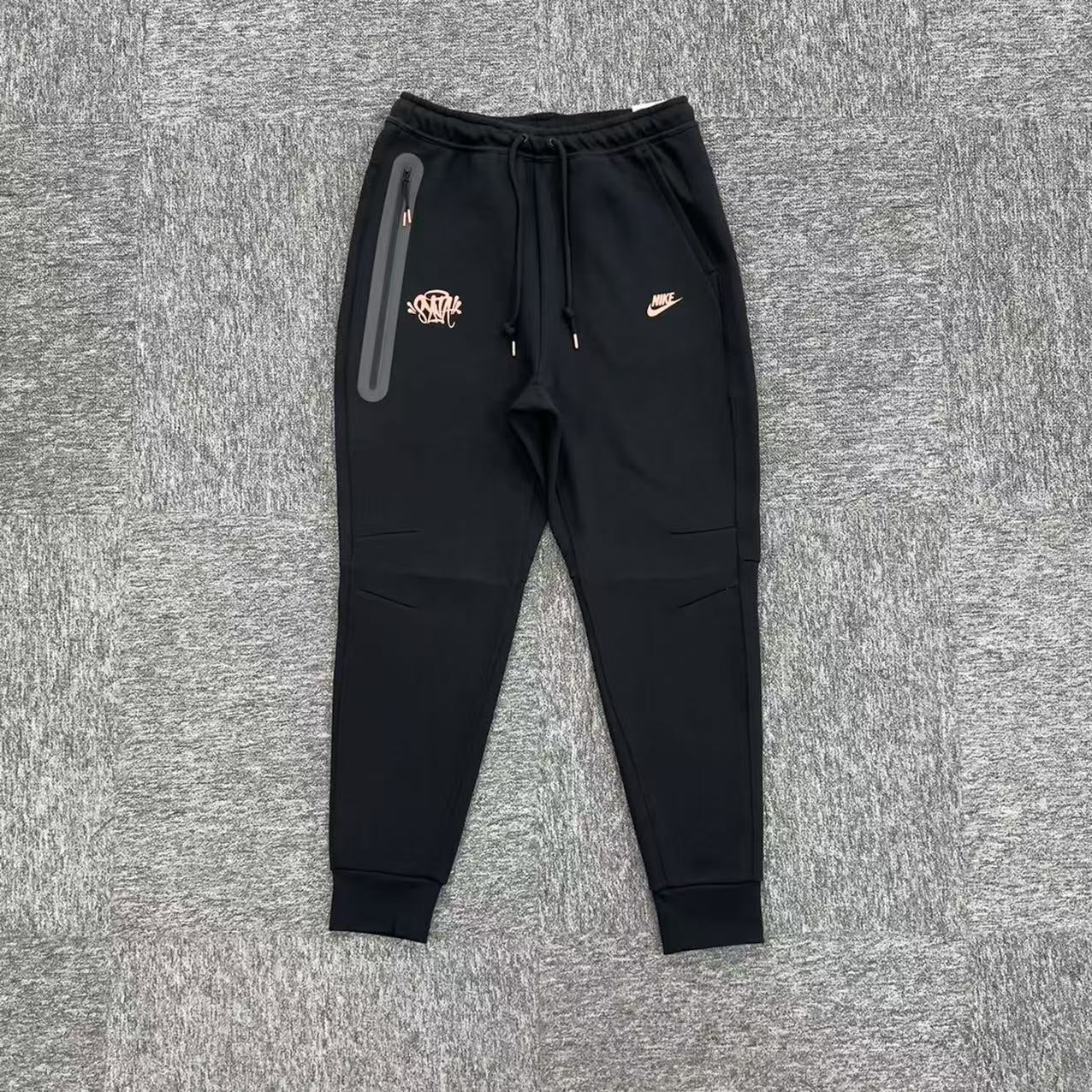 NK X C. CEE TECH FLEECE TRACKSUIT