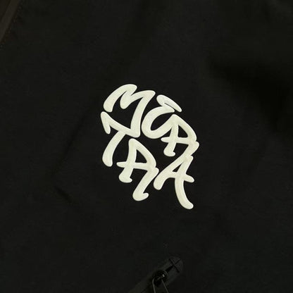 M*RTRA "MONOGRAM SHELL" JACKET - Black